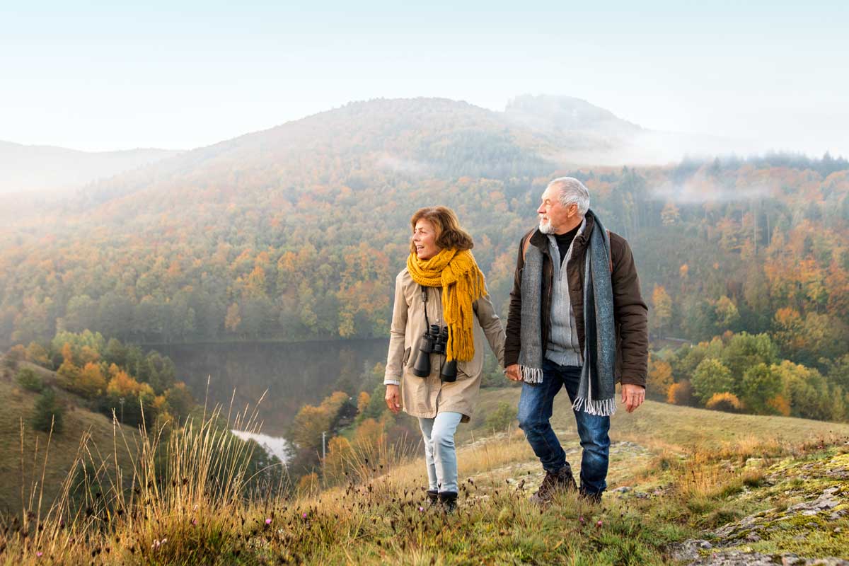 Woman and man hiking Woman and man hiking